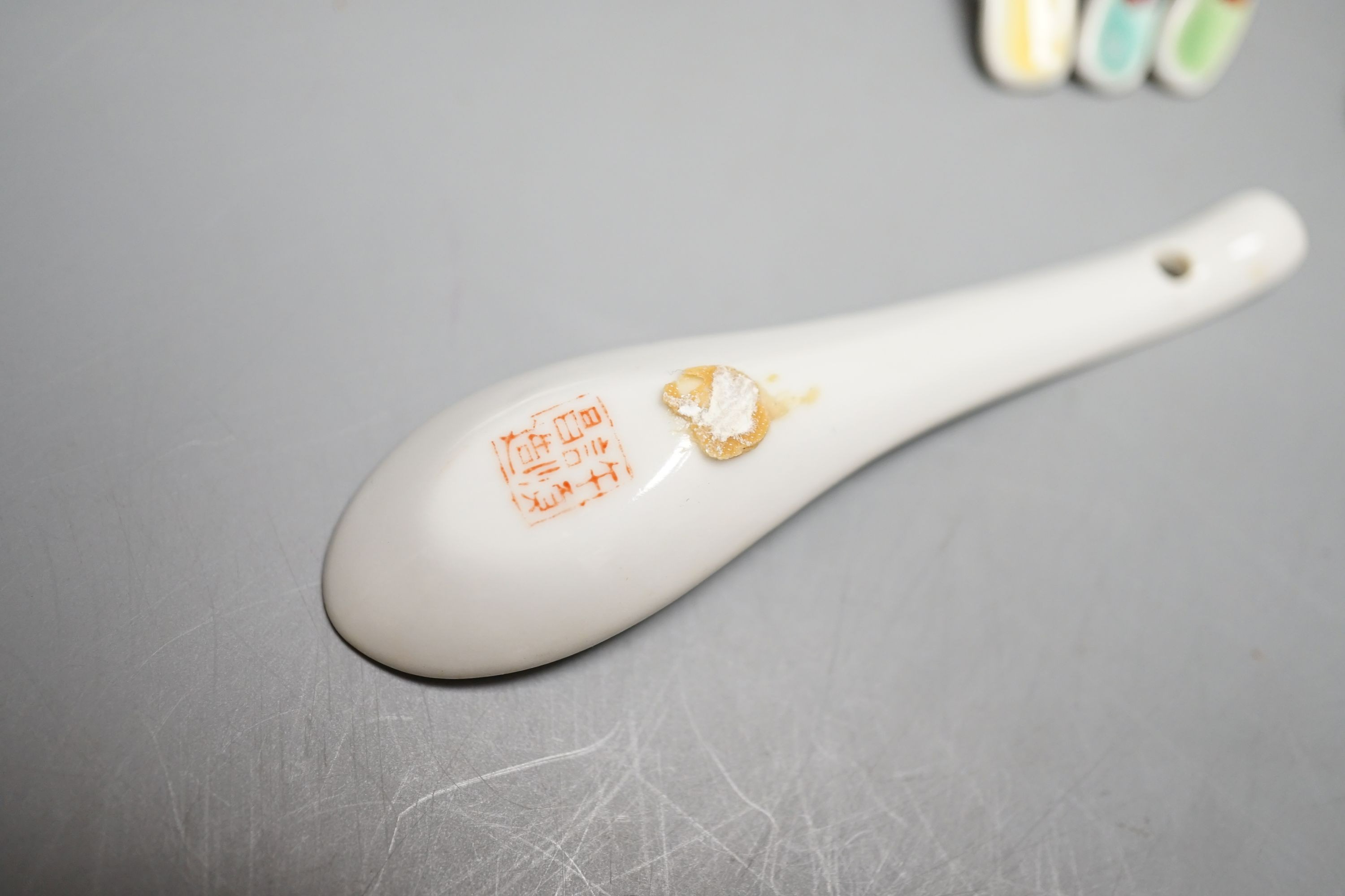 A collection of Chinese Straits porcelain spoons and a dish